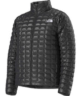 MTHERMOBALLJacket-Black quilted jacket with The North Face logo on a white background