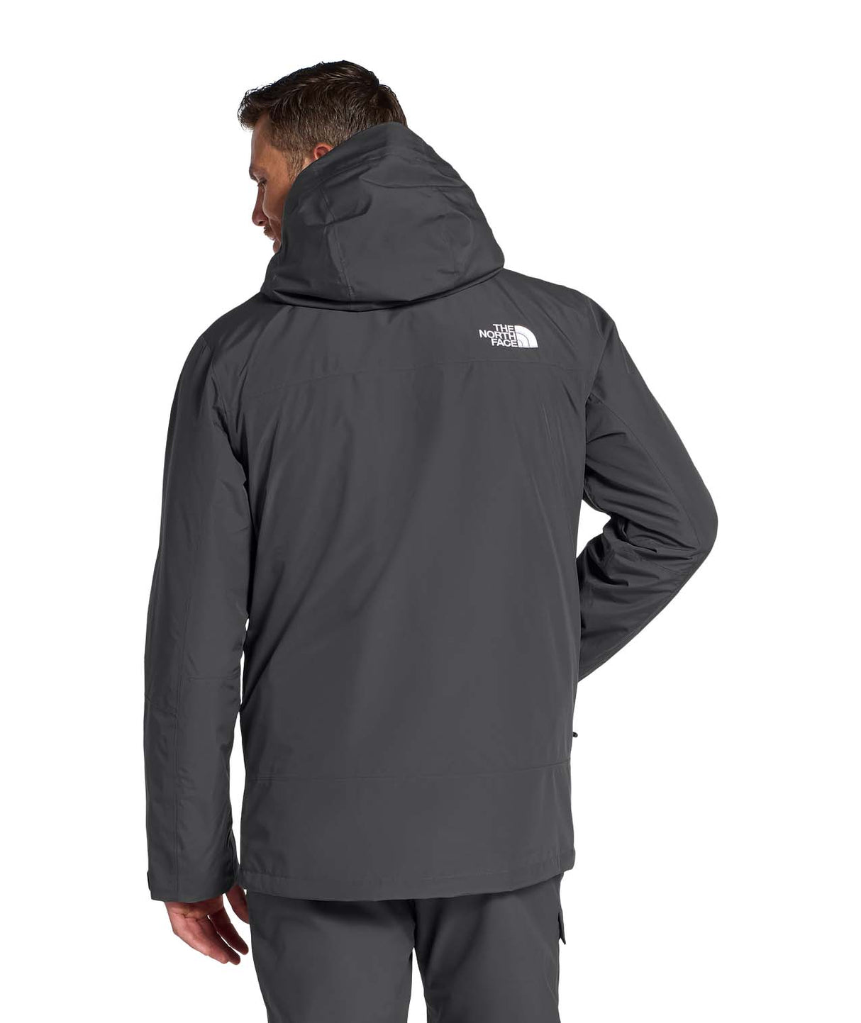 MTHERMOBALLSnowTriclimateJacket- Man wearing a dark grey jacket on a white background