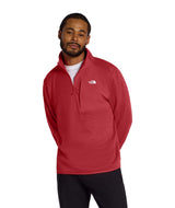 MTNFPerformanceFleece1_4Zip-Man wearing a red pullover with a brand logo on a white background
