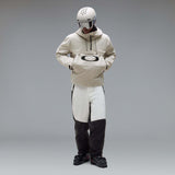 MTimberlineShellAnorak-An off-white hooded anorak jacket with a large black Oakley logo on the chest, displayed against a neutral gray gradient background.