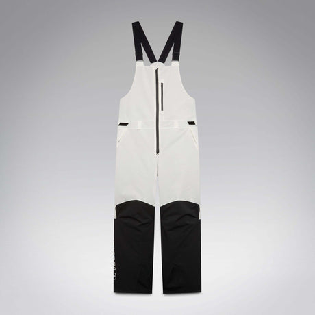 MTimberlineShellBib-A white and black technical snow bib with adjustable shoulder straps, a front zipper, and reinforced lower leg panels, shown against a neutral gray gradient background.