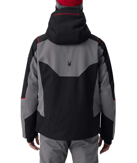 MTitanJacket- Man wearing a black, red, and grey ski jacket on a white background
