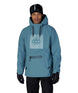 MWaterproofHoody-A man wearing a light blue hooded snowboard jacket with a large square 686 brand logo on the chest, black gloves, and a black beanie with goggles, set against a plain white background.
