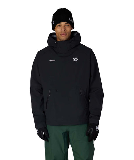 MWindstopperPulloverHoody-Person wearing a black jacket with a logo on a white background