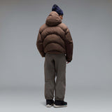MWintertideSoftshellPant-A pair of gray snow pants with a black belt and a small black Oakley logo on the left thigh, displayed against a neutral gray gradient background.