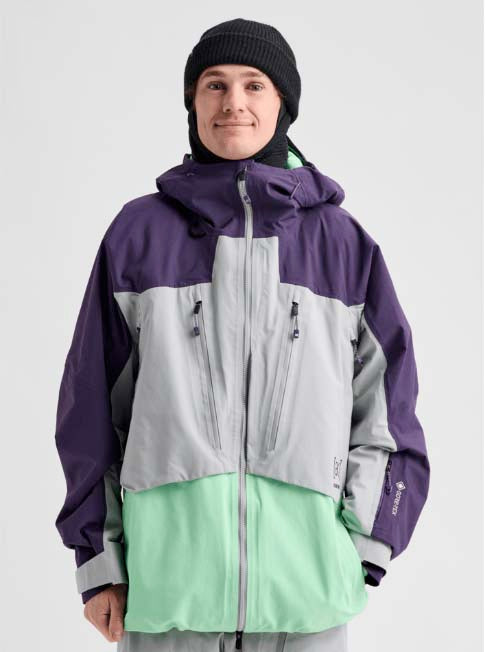 M_ak_SwashSyntheticInsulatedGORE-TEX2LJacket-Multicolored jacket with purple, gray, and green sections on a white background