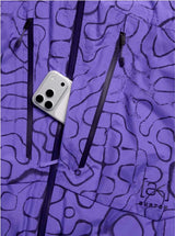 M_ak_SwashSyntheticInsulatedGORE-TEX2LJacket-Purple jacket with a geometric pattern on a white background