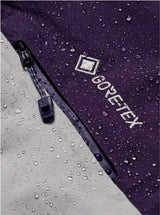 M_ak_SwashSyntheticInsulatedGORE-TEX2LJacket-Multicolored jacket with purple, gray, and green sections on a white background