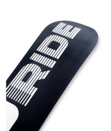 Manic- Black multicolored snowboard on a white background