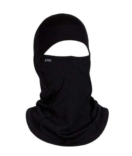 MerinoAdventureIIBalaclava-A black knit balaclava face mask with an eye opening, featuring a small white 'xtm' logo on the left side, shown against a plain white background.