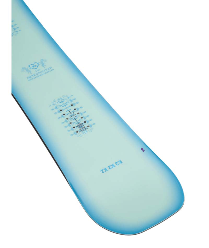 Metropolitan- Teal, light blue, and pink multicolored snowboard on a white background