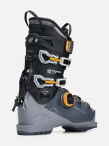 Mindbender100BOA- A K2 Mindbender ski boot in gray and black with yellow accents, shown from a side profile on a light gray background.