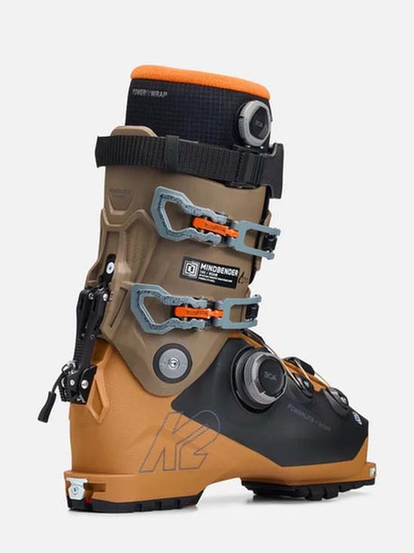 Mindbender140BOA- Brown and black ski boot with orange accents on a white background