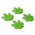 MiniSeaweed- Four green cannabis leaf-shaped stomp pads on a white background