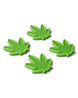 MiniSeaweed- Four green cannabis leaf-shaped stomp pads on a white background