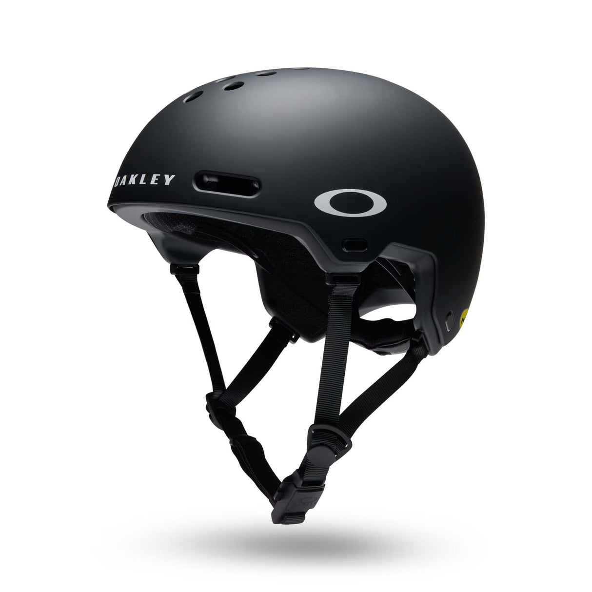 ModPrk-A matte black Oakley helmet with white logo branding, shown from a three-quarters side profile against a clean white background with a soft drop shadow.