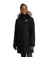 W Arctic Parka-Person wearing a black coat with fur-lined hood on a transparent background