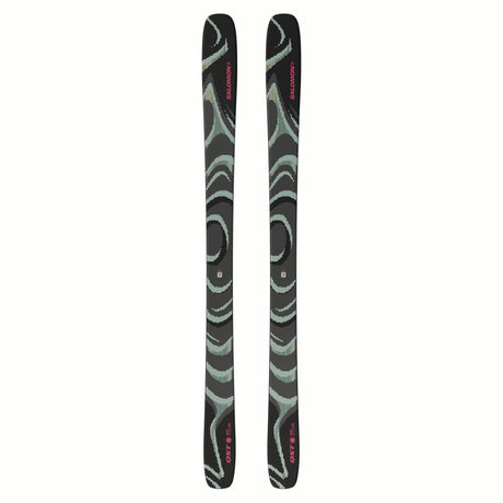 NQST100- Pair of skis with green and black design on a white background