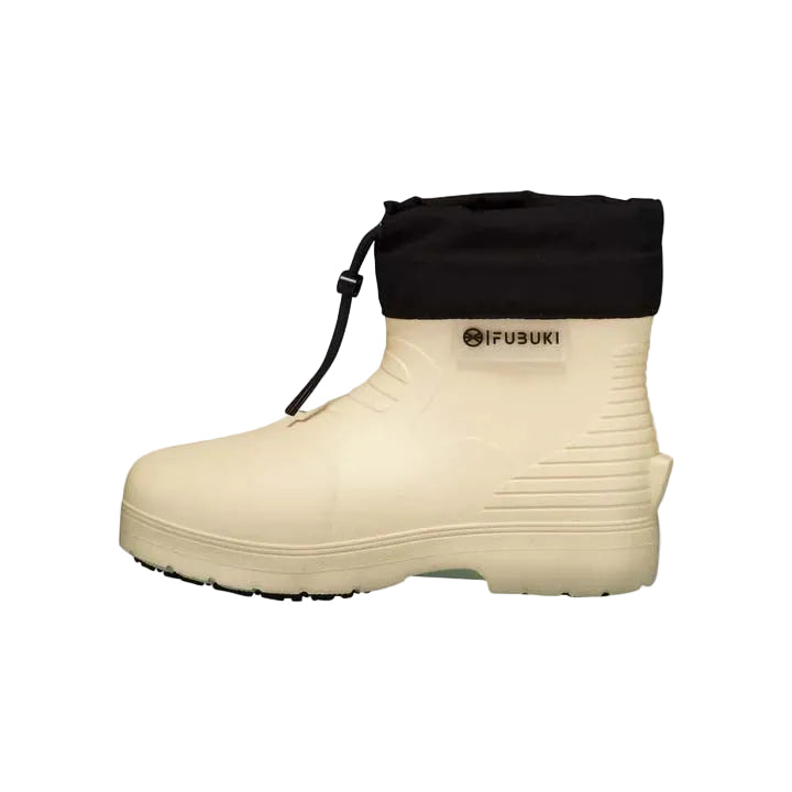 Niseko3.0Low- Beige rubber boot with black top on a white background