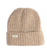 NordenBeanie- Beige beanie with a brand label on a white background