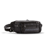 Patagonia Black Hole Waist Pack 5L- Black waist bag with Patagonia logo on a white background