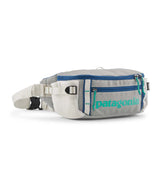 Patagonia Black Hole Waist Pack 5L-Gray waist bag with blue accents and Patagonia branding on a white background
