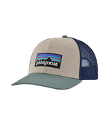 Patagonia P-6 Logo Trucker Hat- Cream Trucker Hat with a navy mesh back and a teal brim that has the Patagonia logo on the front