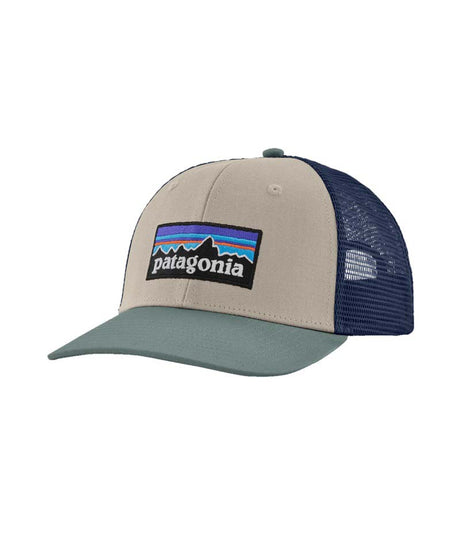 Patagonia P-6 Logo Trucker Hat- Cream Trucker Hat with a navy mesh back and a teal brim that has the Patagonia logo on the front