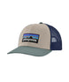 Patagonia P-6 Logo Trucker Hat- Cream Trucker Hat with a navy mesh back and a teal brim that has the Patagonia logo on the front