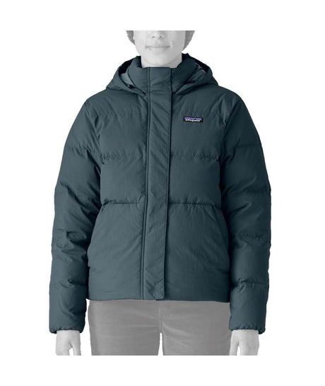 Patagonia Sisar Down Hoody Womens Jacket- Dark blue puffer jacket with a brand logo on a white background