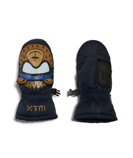 PuppetMitt-A pair of navy blue children's winter mittens shown flat against a white background. One mitten features a cartoon bear face graphic with a blue bandana and the letters 'X TM' embroidered on the cuff, while the other mitten shows the back with black textured grip panels on the palm side.