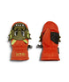 PuppetMitt-A pair of bright orange children's winter mittens shown flat against a white background. One mitten displays a green cartoon monster face with yellow accents, and the other shows the back with black elasticized wrist panels and a small black brand tag.