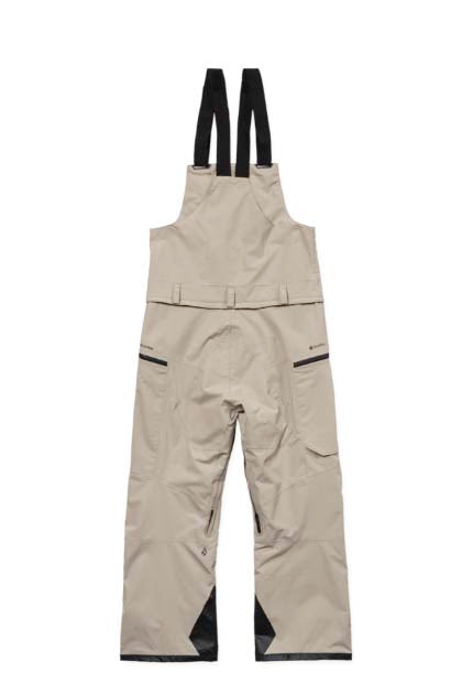 RainGor-TexBib- Cream snow pants with overalls that are black on a white background 