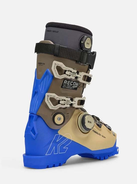 Recon140BOA-A ski boot in blue, beige, and gray with BOA dials and buckles, shown from a side profile on a light gray background.