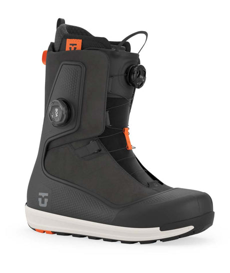 Reset-Black snowboard boot with orange accents on a white background