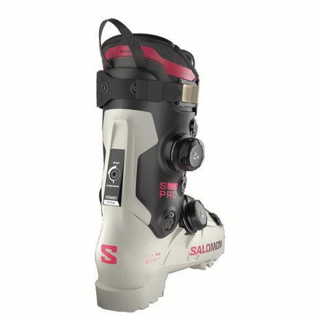 SPROSUPRADUALBOA130-Salomon ski boot with black and pink accents on a white background