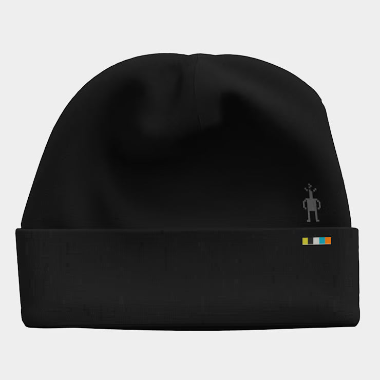 Thermal Merino Reversible Cuffed Beanie- Black beanie with a small logo on a light gray background