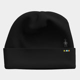 Thermal Merino Reversible Cuffed Beanie- Black beanie with a small logo on a light gray background