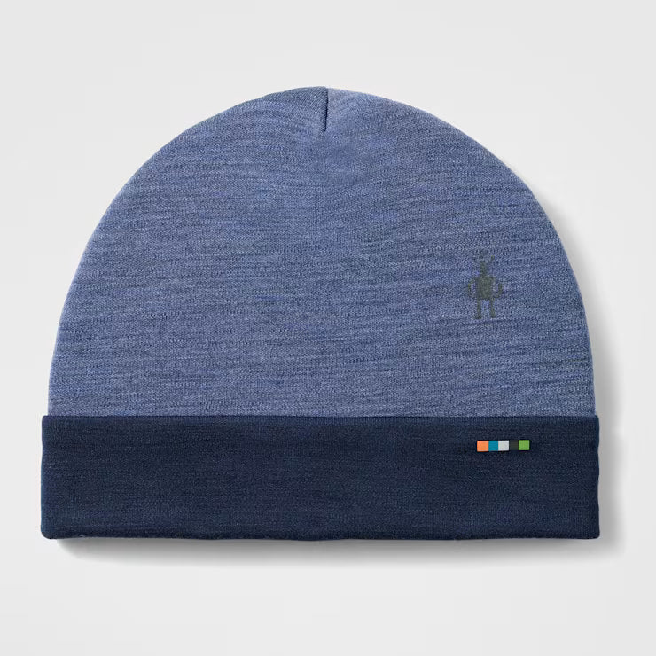 Thermal Merino Reversible Cuffed Beanie-Blue beanie with a brand logo on a light gray background