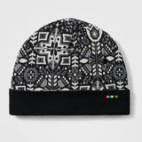 Thermal Merino Reversible Cuffed Beanie-Black and white patterned beanie on a light gray background
