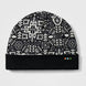 Thermal Merino Reversible Cuffed Beanie-Black and white patterned beanie on a light gray background