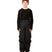 ScoobieIIPant-A child model wearing black snow bib overalls with suspenders, a black long-sleeve shirt, black snow boots, and a burgundy knit beanie, standing against a solid white background.