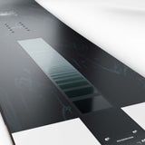 Sight- Black multi colored snowboard on a white background
