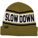 SlowDownBeanie- An olive green knit beanie with a white horizontal stripe across the middle featuring the words 'SLOW DOWN' in black. The beanie also has black stripes above and below the white band and a small black 'SPIRAL' brand tag on the folded cuff.