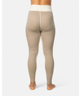 SmekkerHighWaistBaseLayerPant-Beige leggings with a white waistband on a white background