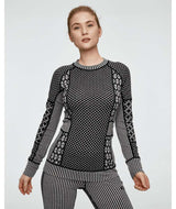 SmekkerLongSleeveBaseLayer-Black and white patterned sweater on a white background