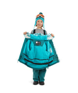 SnowballJacket-A child wearing a winter ski outfit consisting of a light blue and white camouflage-patterned jacket, teal snow pants, a matching teal beanie with orange goggles, and blue gloves, standing against a plain white background.