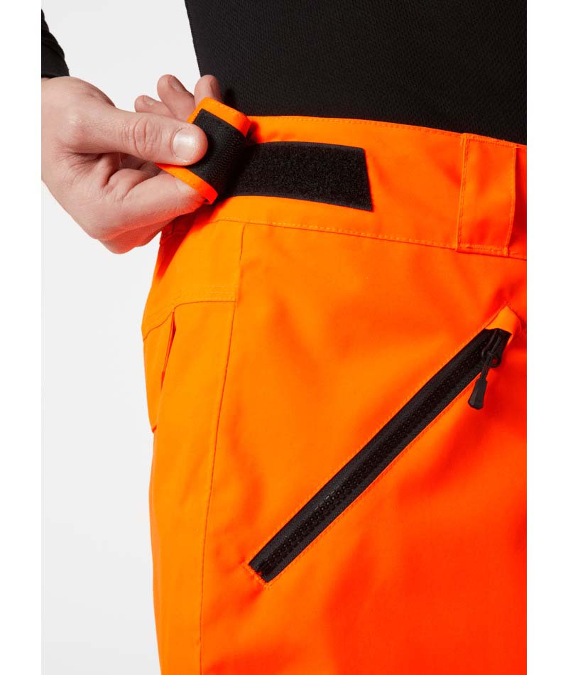 SognCargoPant-Orange snow pants with black accents on a white background