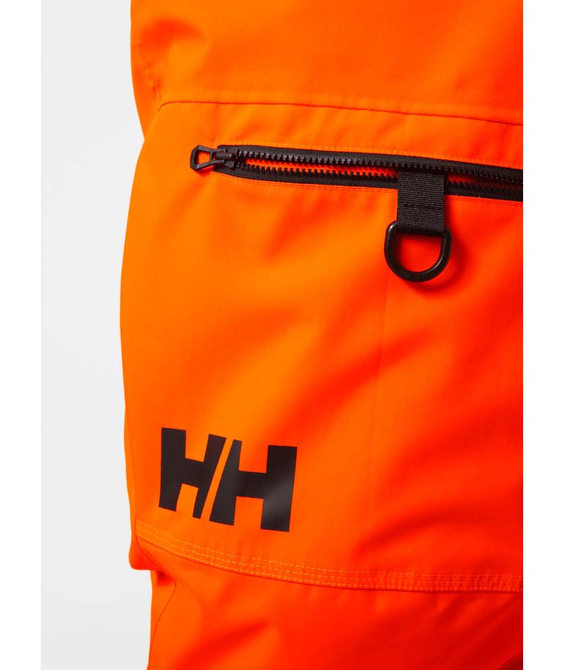 SognCargoPant-Orange snow pants with black accents on a white background