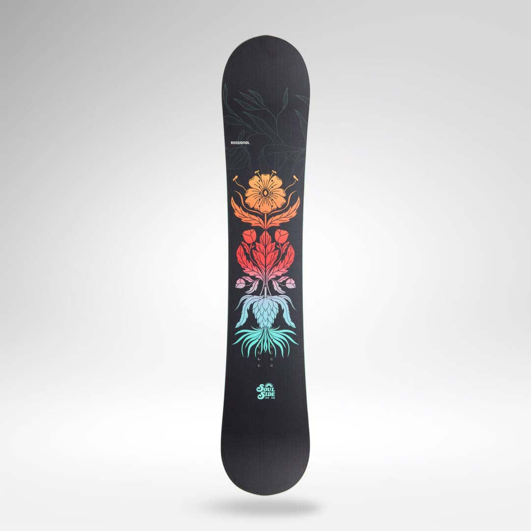 Soulside- Black snowboard with a multicolored floral pattern in the center on a white background